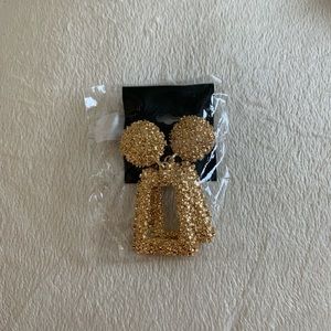 Gold statement earrings